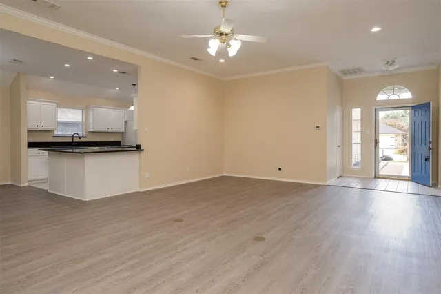 a view of a kitchen with a sink and a stove