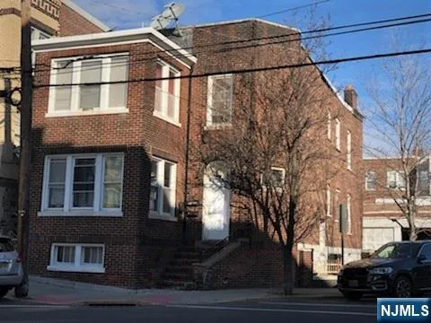 a view of a building with a street