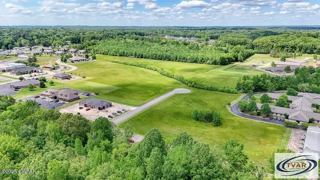 a view of a lake with a city
