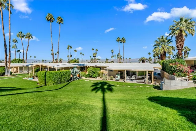 a view of a house with a big yard