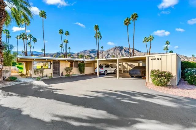 a view of a street with cars