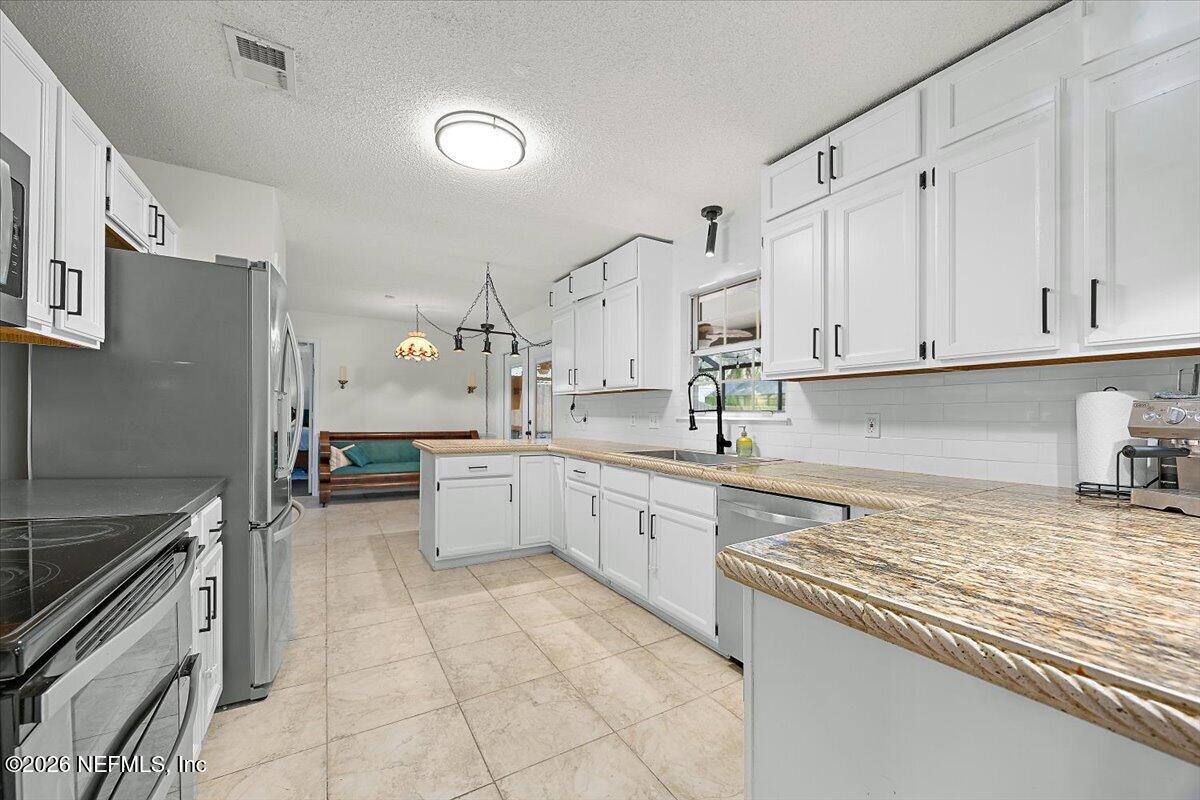 10954 Heathfield Road Jacksonville, FL 32225 - Photo 8 of 32 09-Kitchen