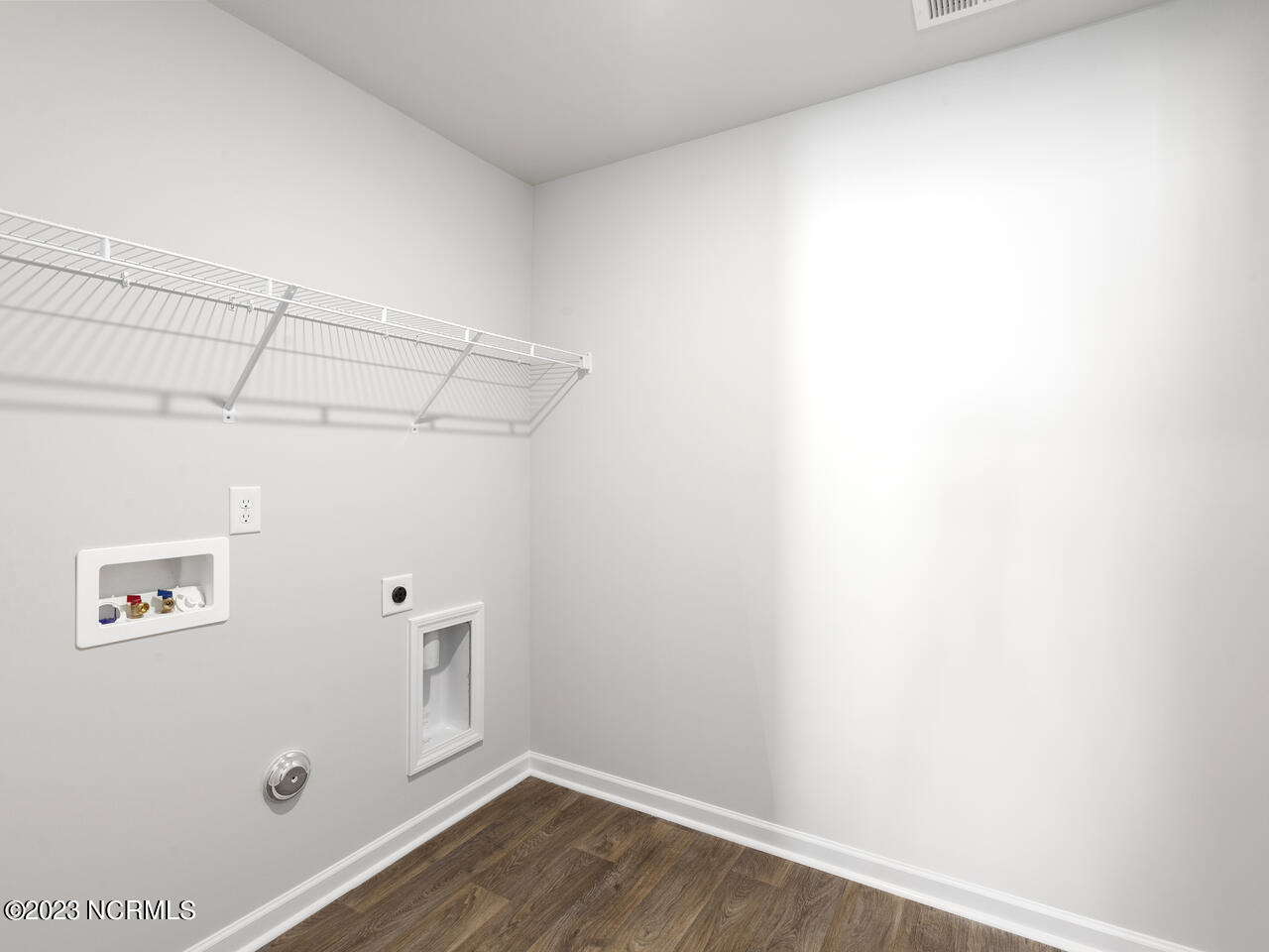 402 Folkstone Road, Unit LOT 71 Holly Ridge, NC 28445 - Photo 31 of 37 upstairs laundry room