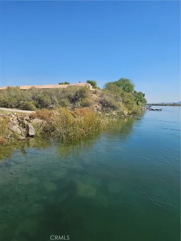 a view of lake with mountain