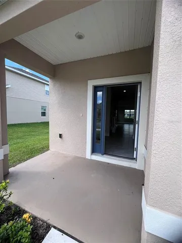 a view of a room with a yard