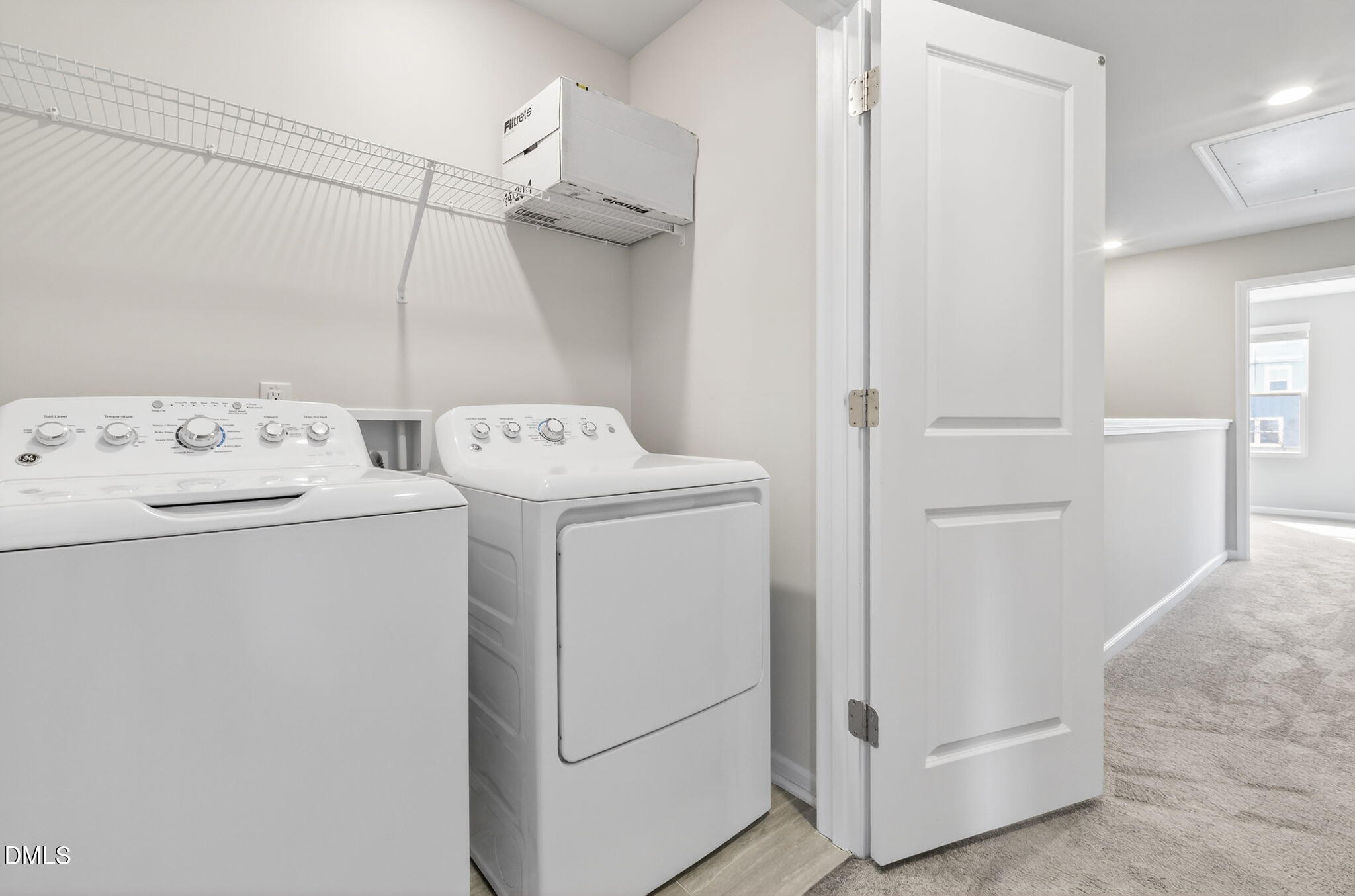 6626 Perry Creek Road Raleigh, NC 27616 - Photo 23 of 40 Hall laundry. Washer & dryer convey