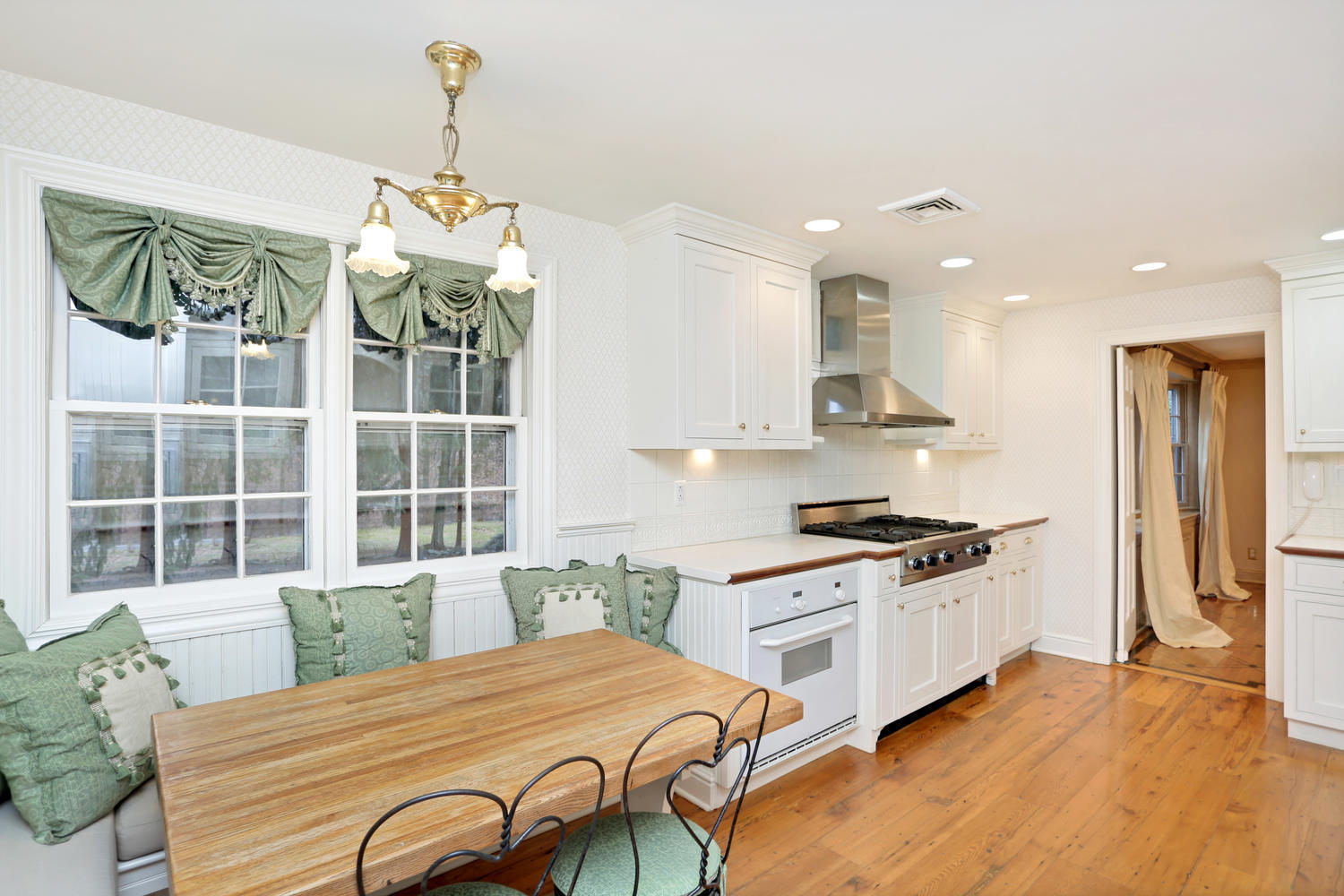 65 Nursery Road New Canaan, CT 06840 - Photo 14 of 37 a bedroom with a bed dresser and a window