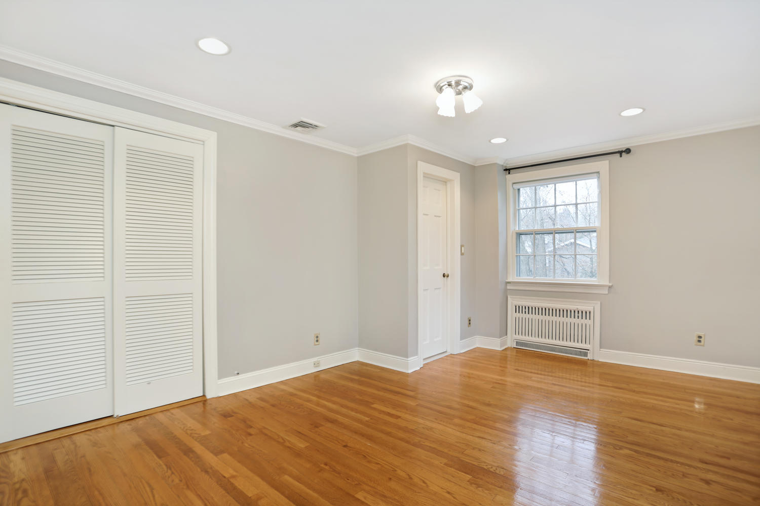 65 Nursery Road New Canaan, CT 06840 - Photo 23 of 37 a view of empty room with wooden floor and fan