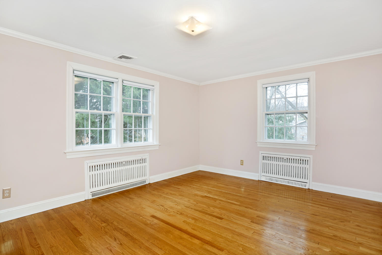 65 Nursery Road New Canaan, CT 06840 - Photo 25 of 37 a view of an empty room with wooden floor and a window