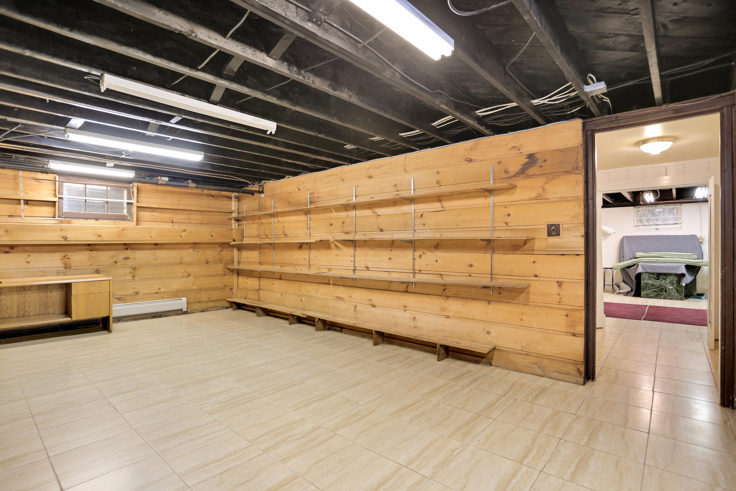 65 Nursery Road New Canaan, CT 06840 - Photo 26 of 37 a view of an empty room with wooden floor