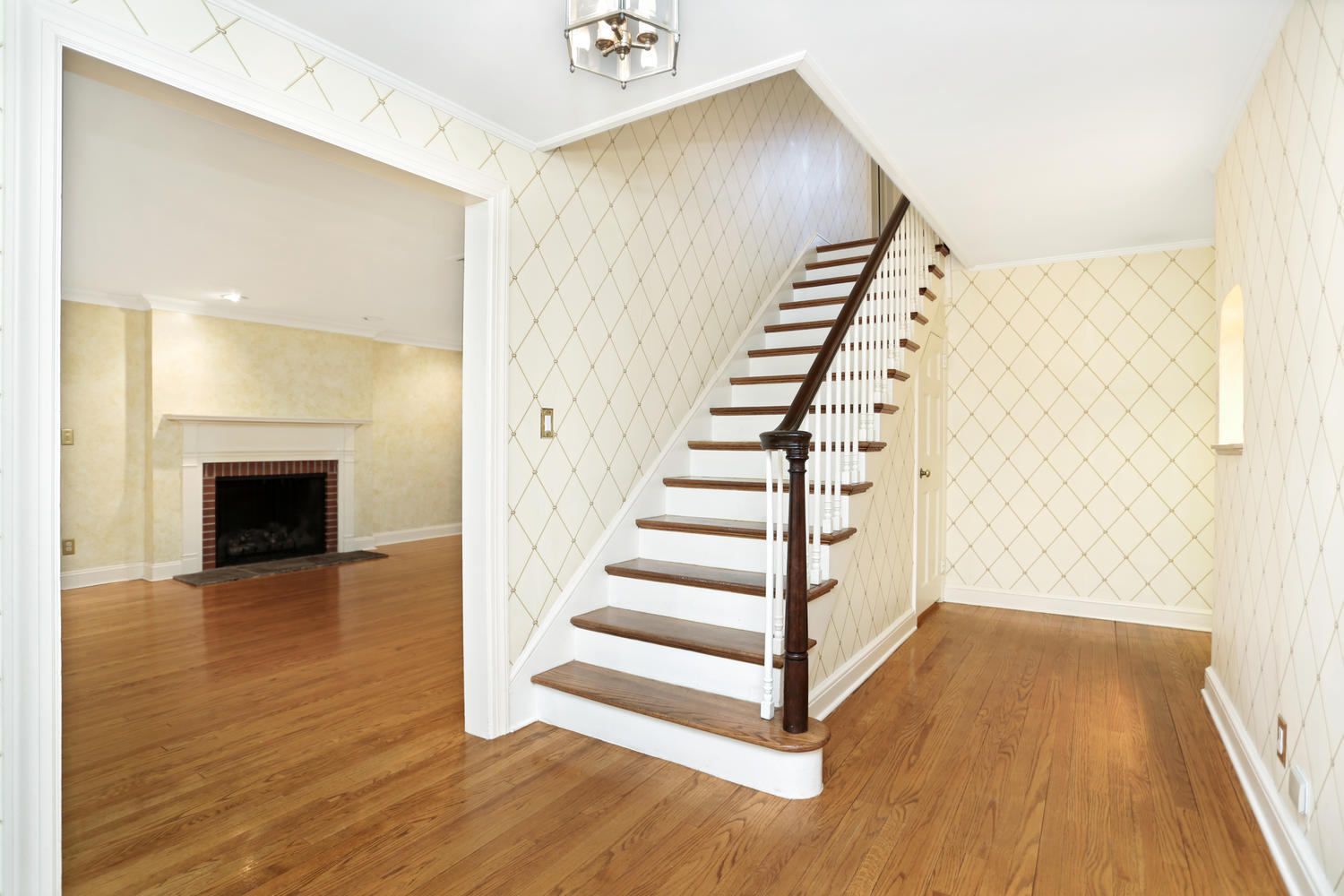 65 Nursery Road New Canaan, CT 06840 - Photo 3 of 37 a view of a livingroom with wooden floor and entryway