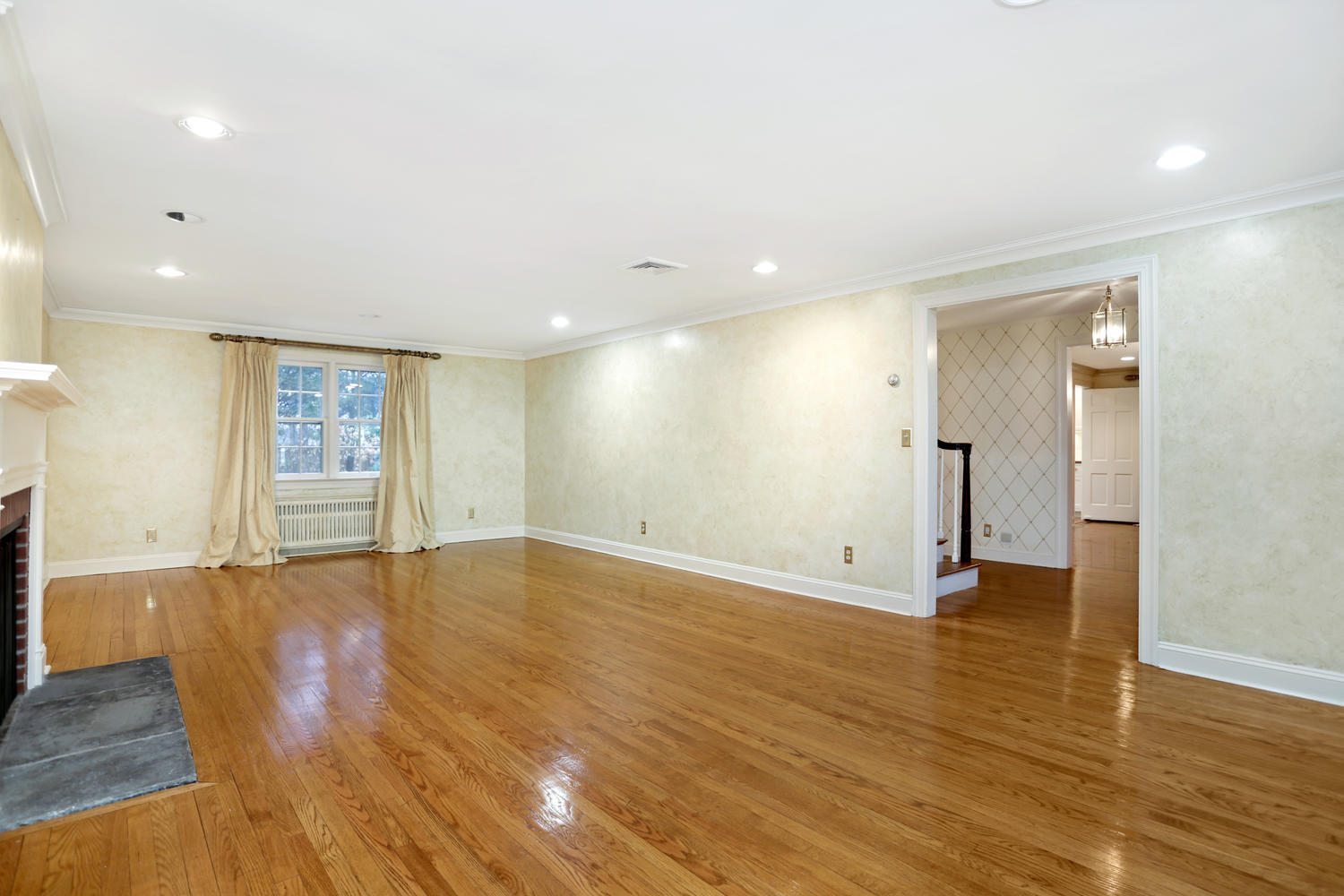 65 Nursery Road New Canaan, CT 06840 - Photo 6 of 37 a view of an empty room with wooden floor