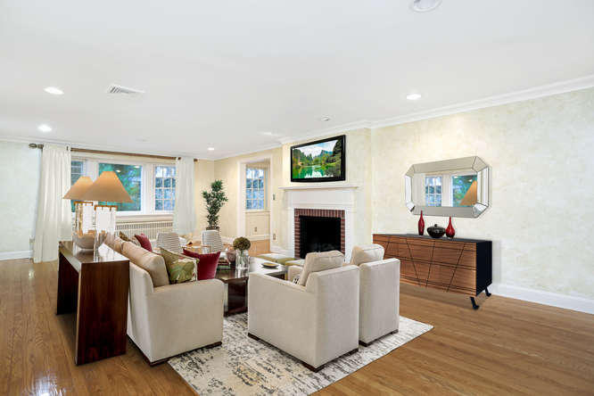 65 Nursery Road New Canaan, CT 06840 - Photo 7 of 37 a living room with furniture a fireplace and a flat screen tv