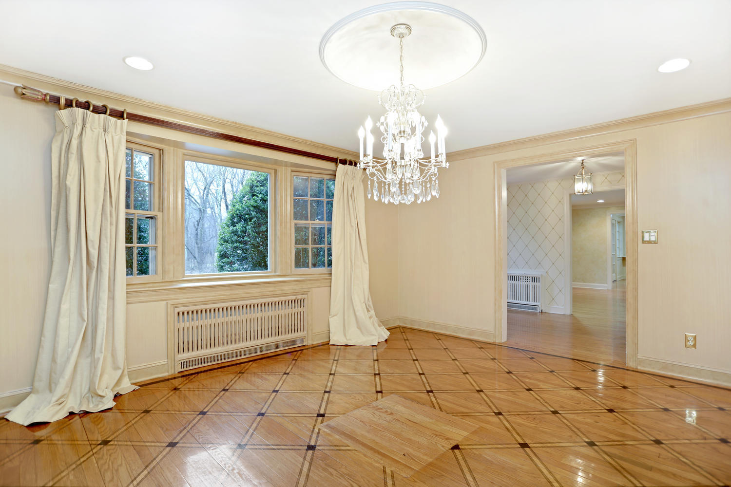 65 Nursery Road New Canaan, CT 06840 - Photo 10 of 37 a view of a livingroom with wooden floor and windows