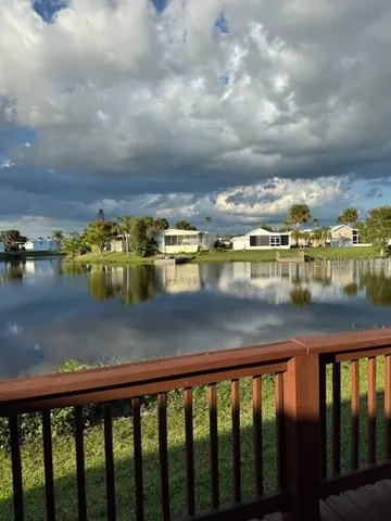 a view of an outdoor space and tennis court