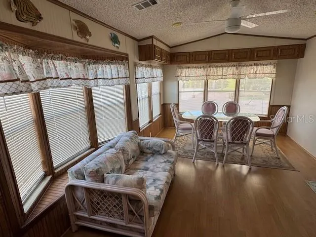 a kitchen with stainless steel appliances granite countertop a stove a sink dishwasher and a refrigerator