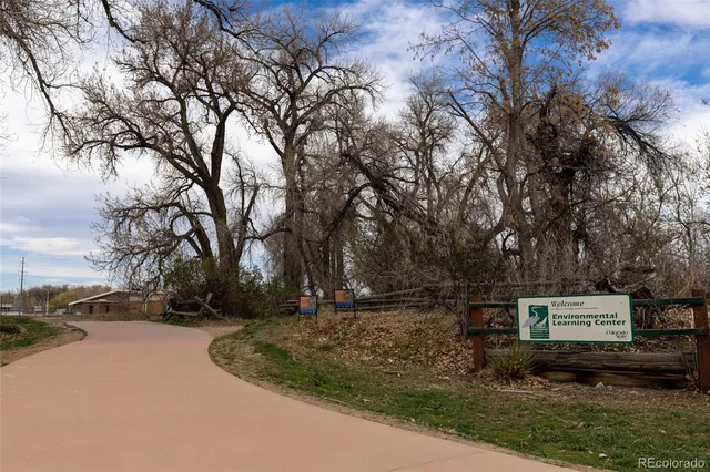 a backyard of a house with lots of trees