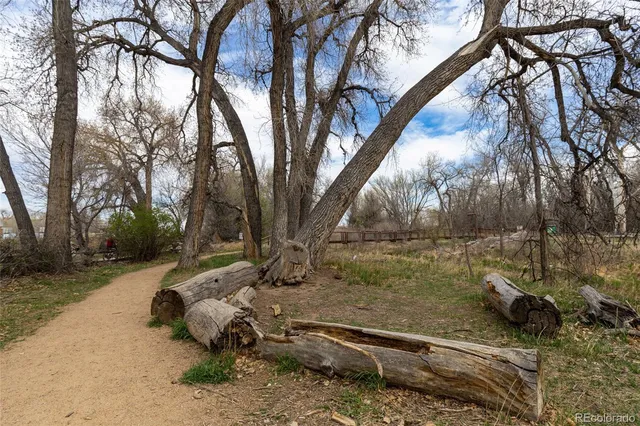 a narrow alley leading to a building