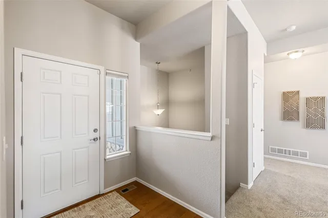 a view of a livingroom with furniture