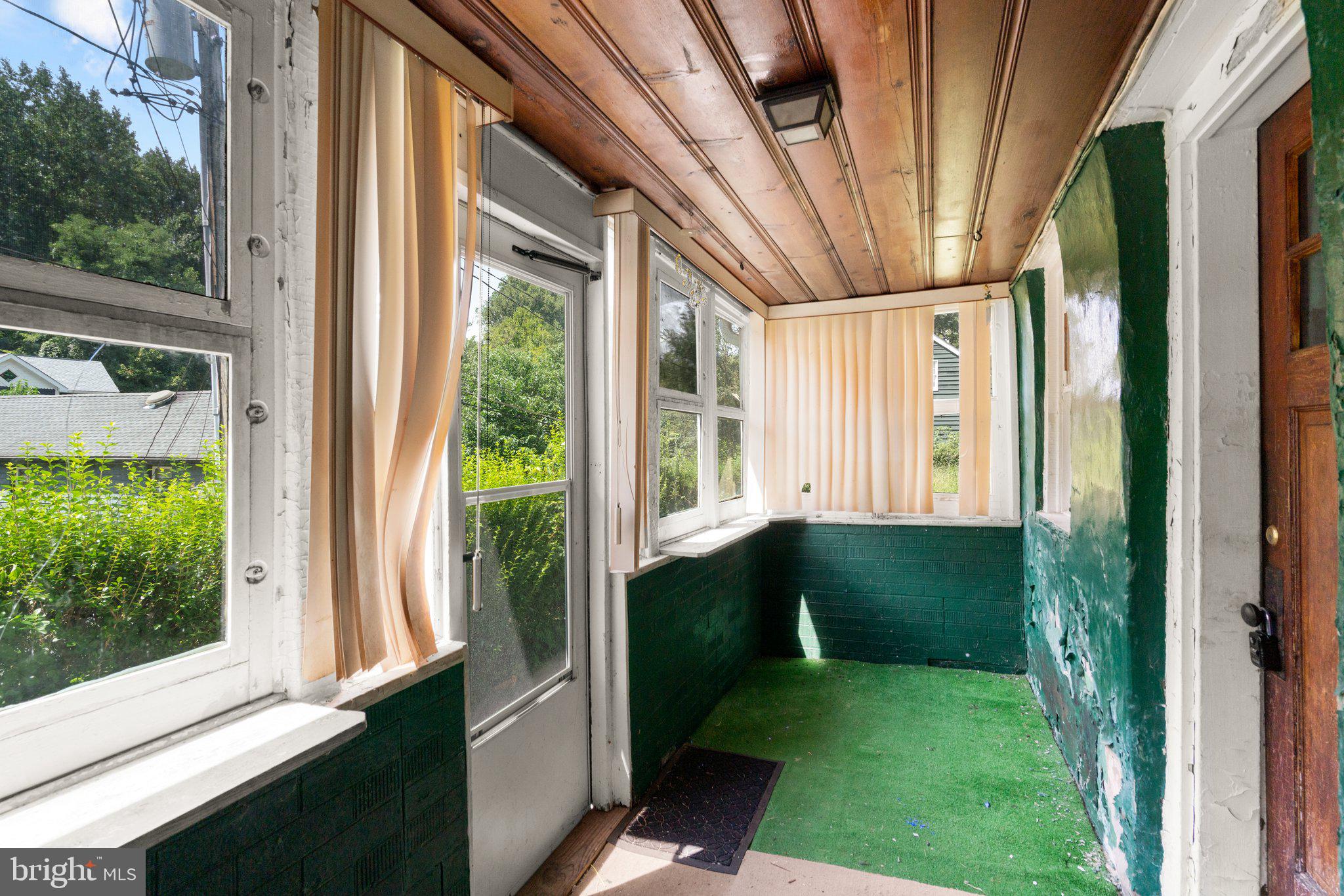 780 Hollow Road Ellicott City, MD 21043 - Photo 11 of 33 Original enclosed porch