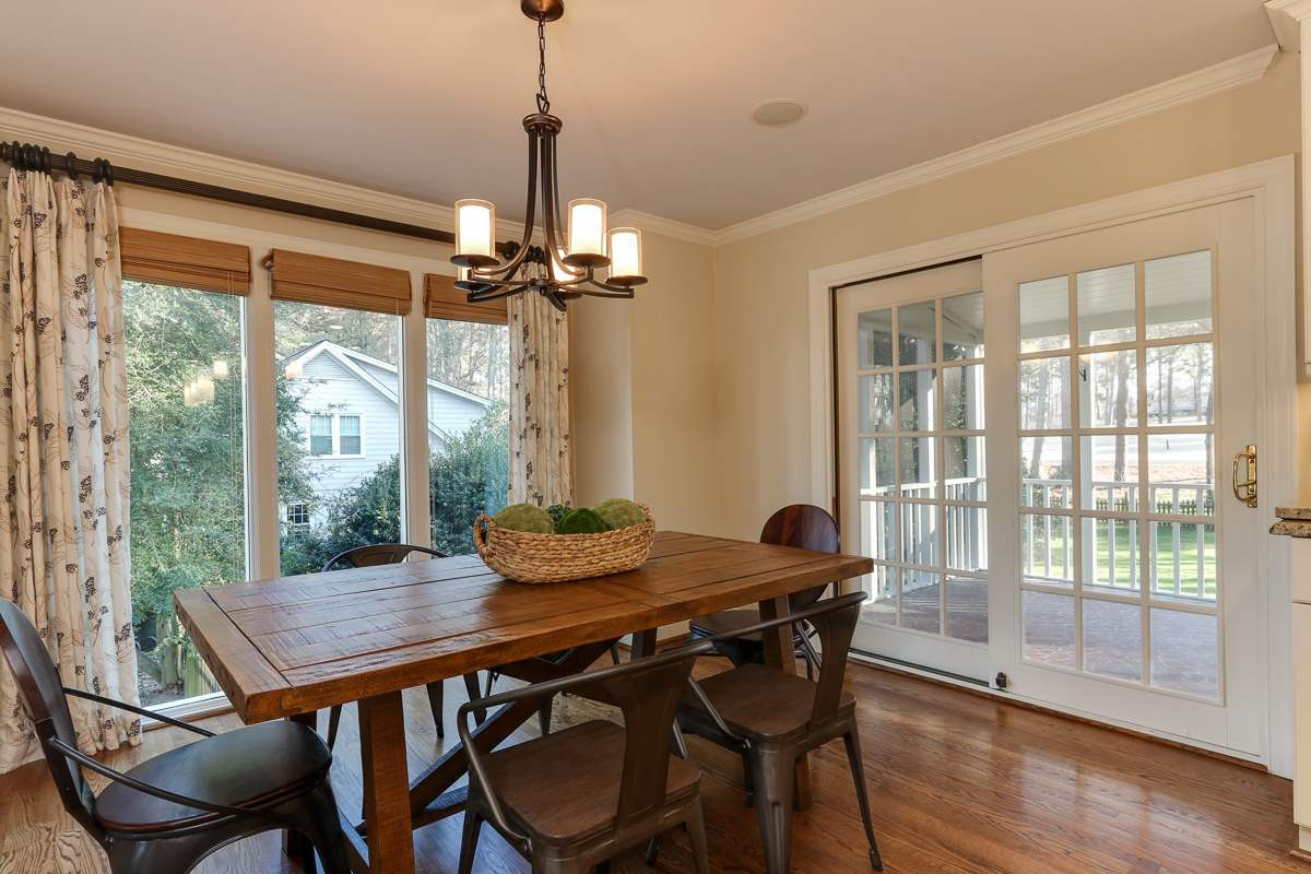 7009 North Ridge Drive Raleigh, NC 27615 - Photo 11 of 25 Breakfast Room has plenty of light and space for farm style table. Breakfast Room