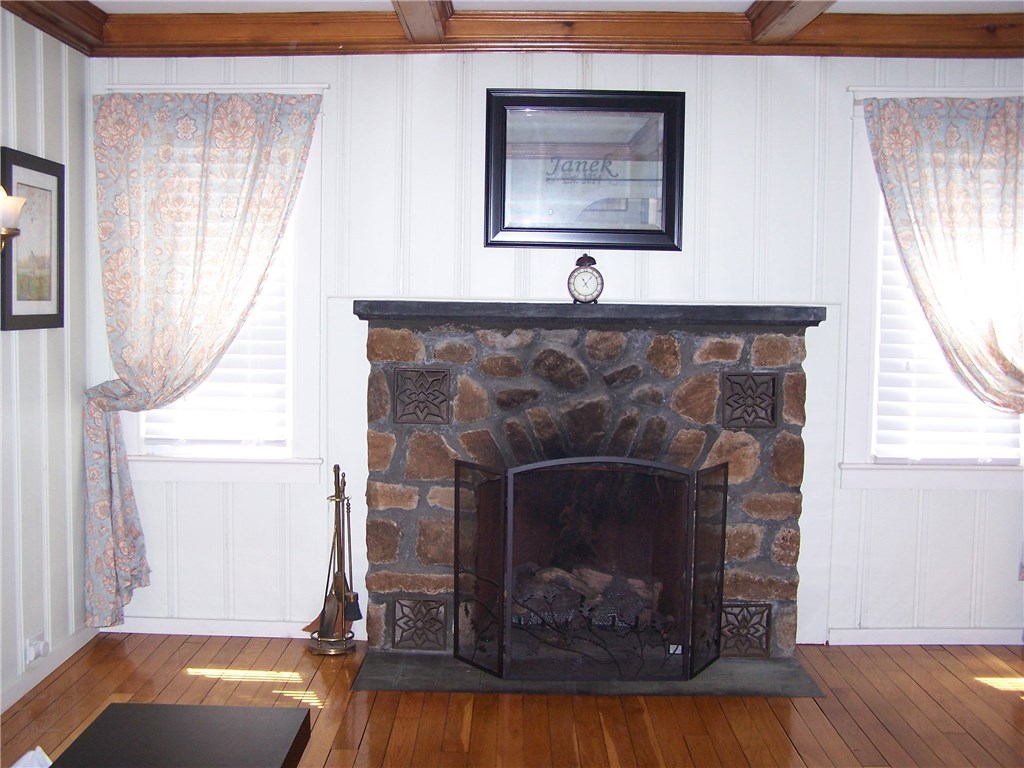 4 Diamond Hill Road Hopkinton, RI 02808 - Photo 15 of 40 living room has hard wood floors, gas fireplace, and lots of day light...