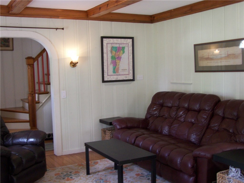 4 Diamond Hill Road Hopkinton, RI 02808 - Photo 18 of 40 still the living room, different angle...view of winding stair case up