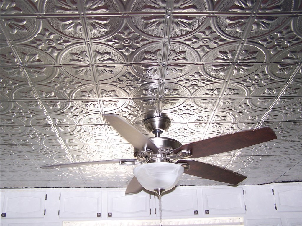 4 Diamond Hill Road Hopkinton, RI 02808 - Photo 22 of 40 tin kitchen ceiling tiles add character to this country kitchen. ceiling fan and white upper kitchen cabinets ...