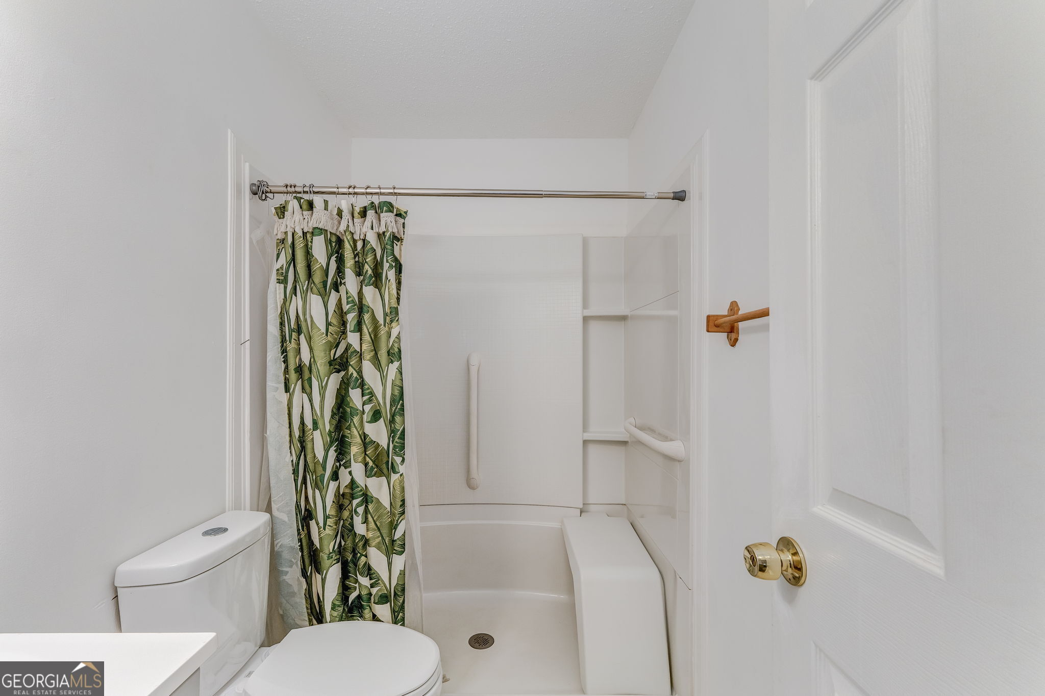1 Green Acre Road Northeast Rome, GA 30165 - Photo 14 of 30 a bathroom with a shower and a toilet