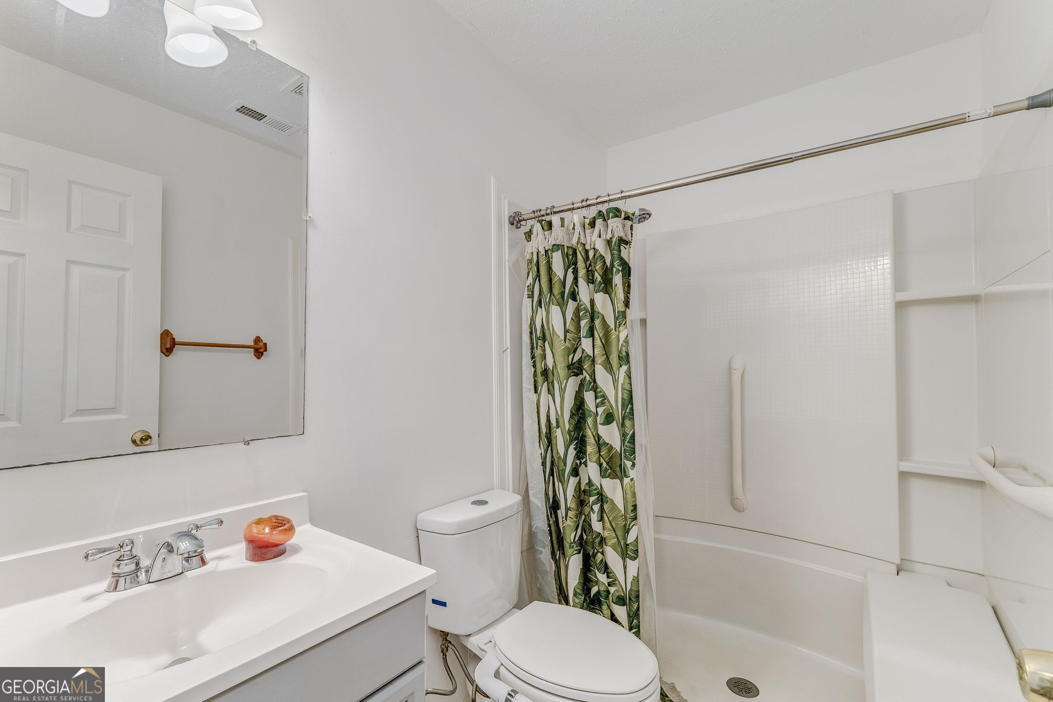 1 Green Acre Road Northeast Rome, GA 30165 - Photo 15 of 30 a bathroom with a sink toilet and shower