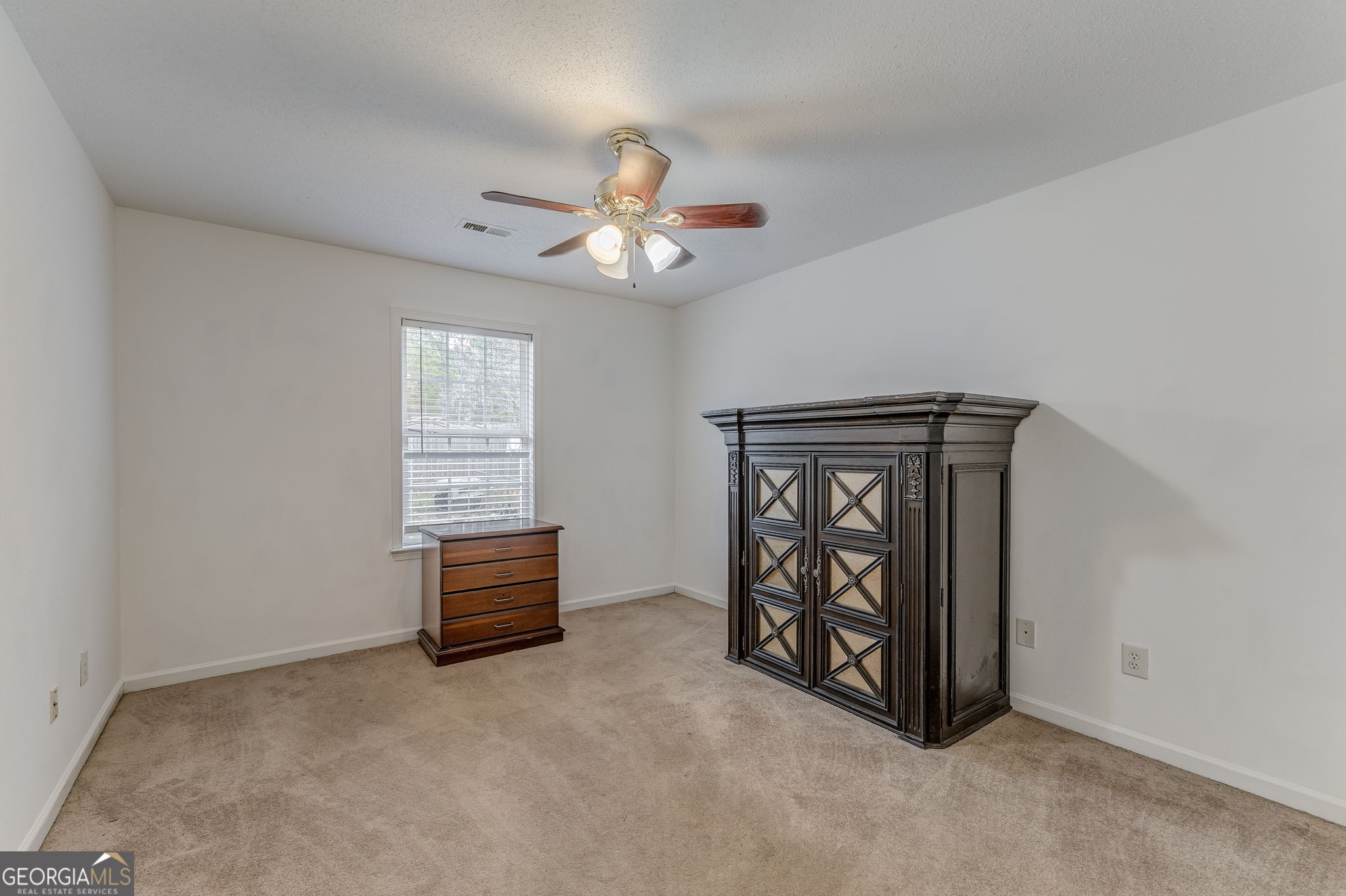 1 Green Acre Road Northeast Rome, GA 30165 - Photo 16 of 30 an empty room with windows and ceiling fan