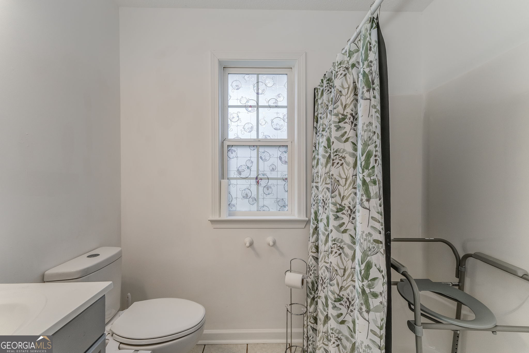 1 Green Acre Road Northeast Rome, GA 30165 - Photo 21 of 30 a bathroom with a toilet a sink and a window