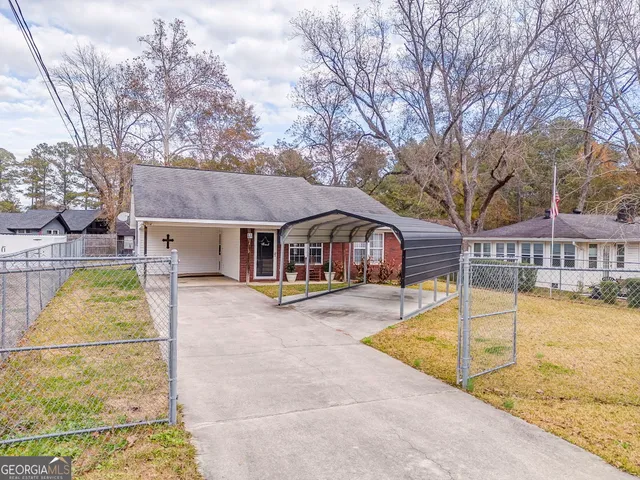 a view of a house with swimming pool