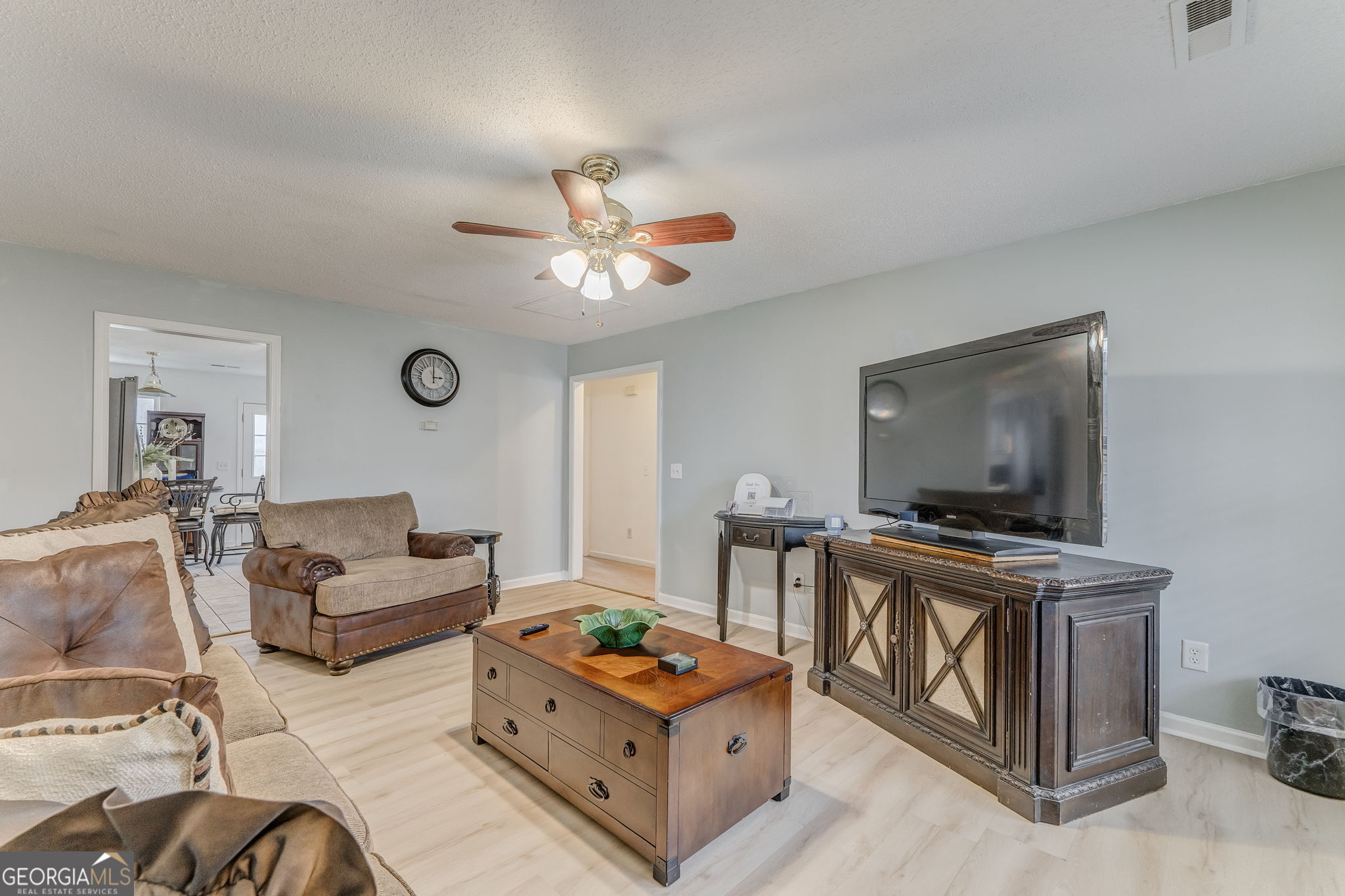 1 Green Acre Road Northeast Rome, GA 30165 - Photo 4 of 30 a living room with furniture and a flat screen tv