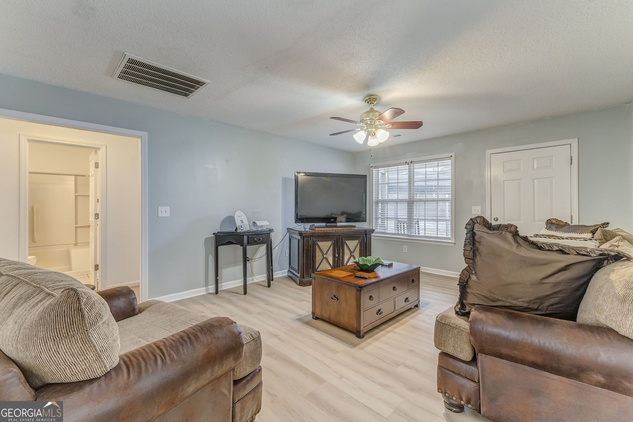 1 Green Acre Road Northeast Rome, GA 30165 - Photo 5 of 30 a living room with furniture and a flat screen tv
