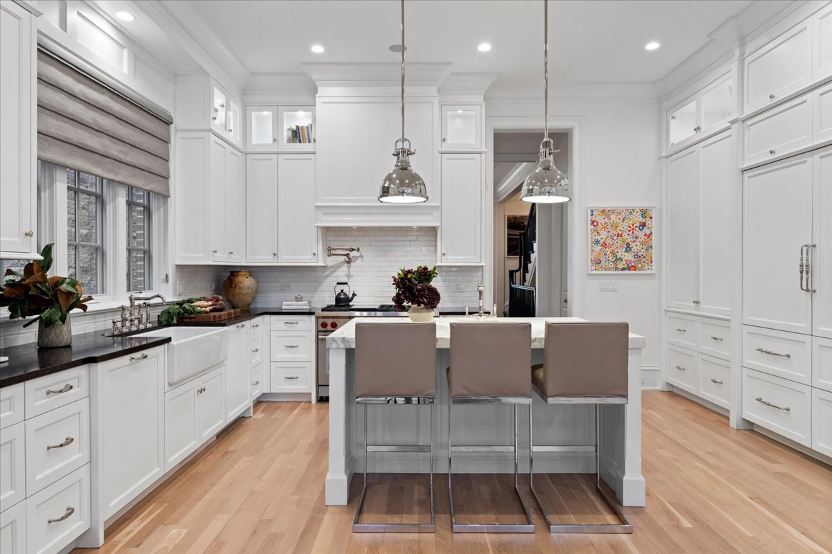 2633 North Dayton Street Chicago, IL 60614 - Photo 11 of 43 a large white kitchen with cabinets