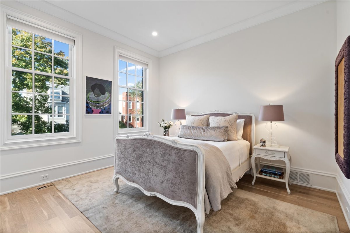 2633 North Dayton Street Chicago, IL 60614 - Photo 26 of 43 a bedroom with a bed and a large window