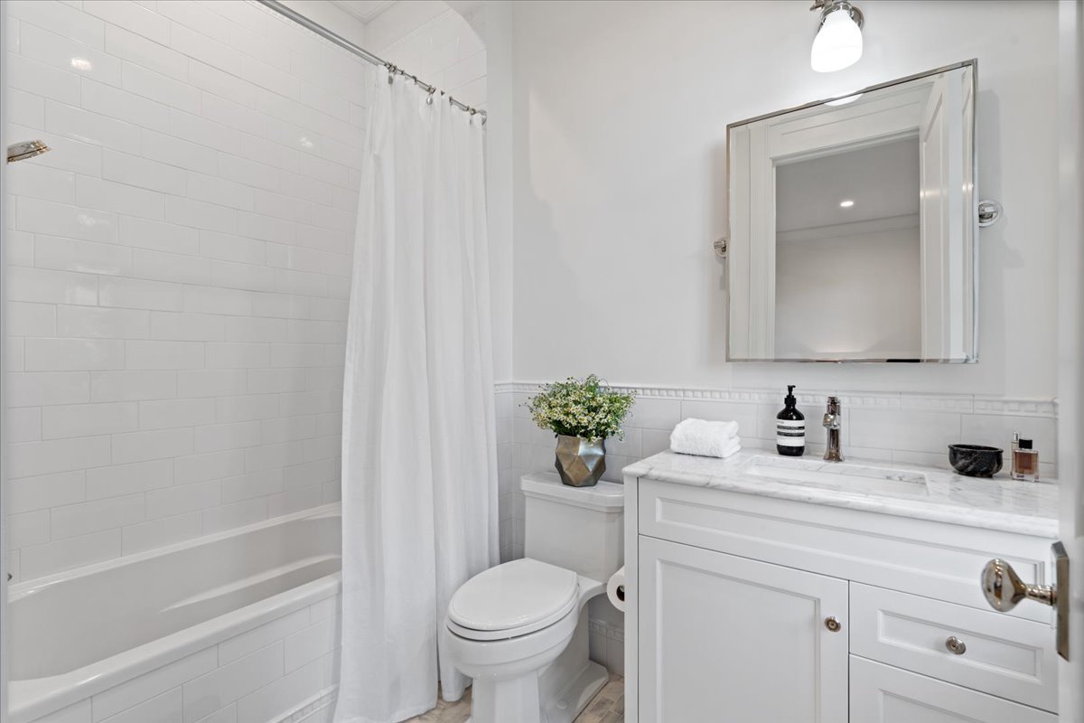 2633 North Dayton Street Chicago, IL 60614 - Photo 27 of 43 a bathroom with a sink toilet and shower