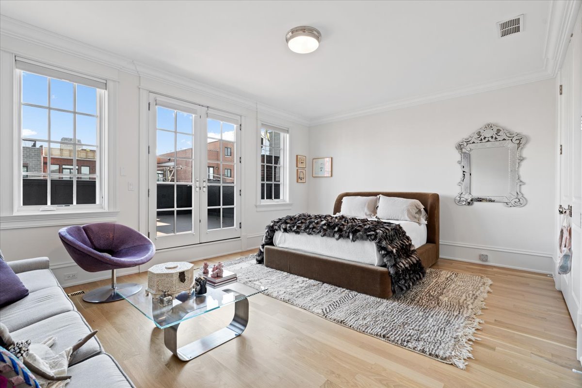 2633 North Dayton Street Chicago, IL 60614 - Photo 28 of 43 a bedroom with furniture and a large window