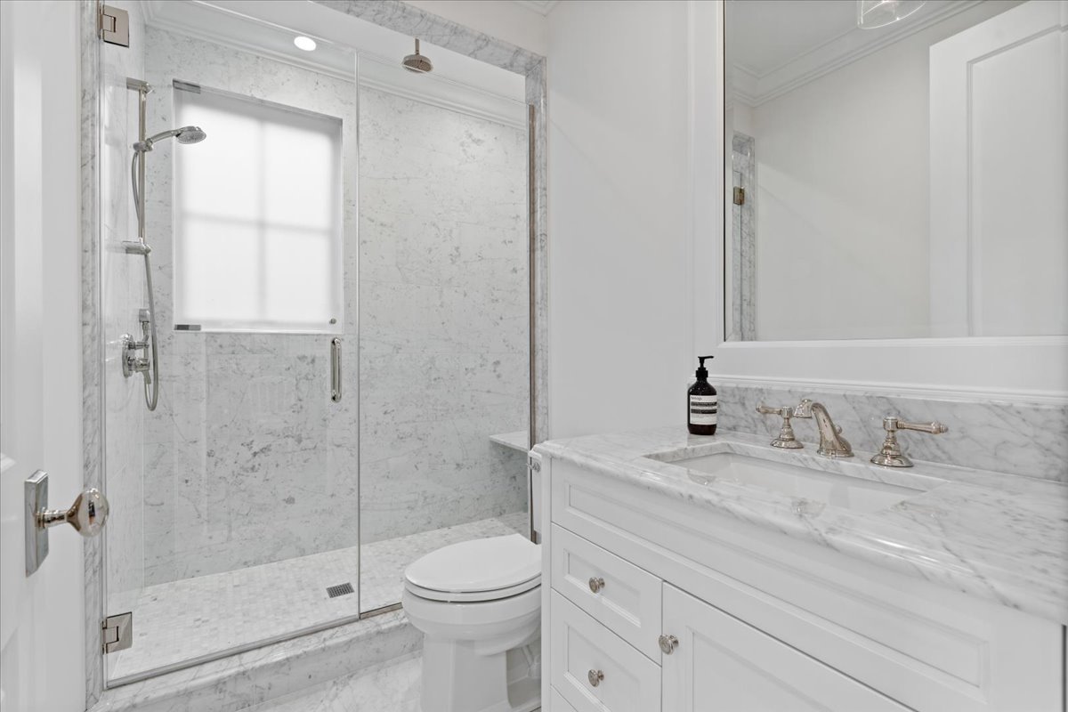 2633 North Dayton Street Chicago, IL 60614 - Photo 29 of 43 a bathroom with a sink a toilet and shower