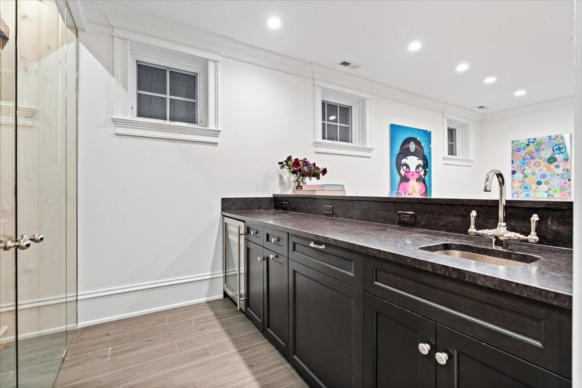 2633 North Dayton Street Chicago, IL 60614 - Photo 33 of 43 a kitchen with a sink cabinets and wooden floor