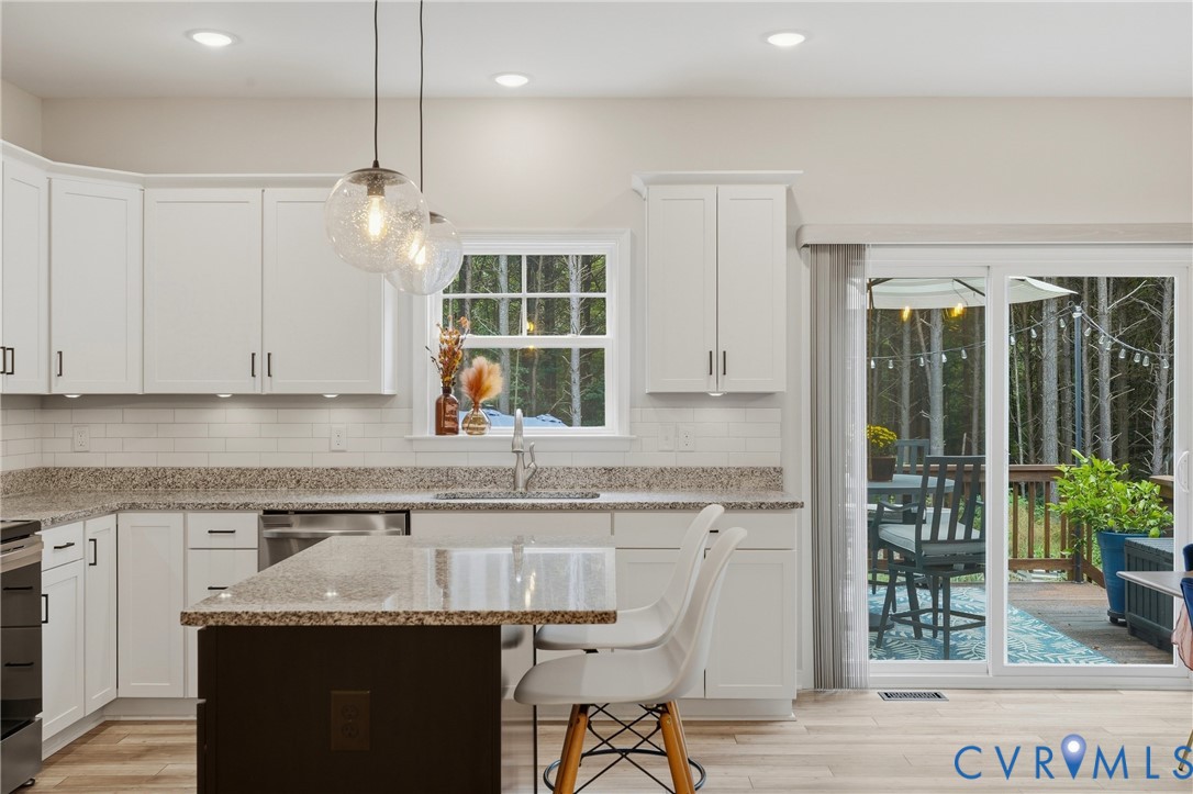 3741 Boundary Run Road Gum Spring, VA 23065 - Photo 15 of 36 White cabinetry, stone countertops, subway tile ba