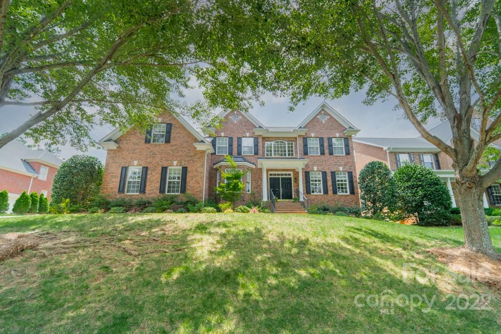 9622 Baileywick Road Charlotte, NC 28277 - Photo 2 of 39 a front view of a house with a garden
