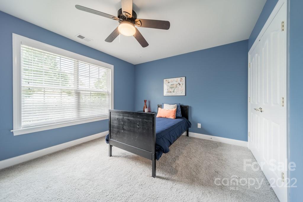 9622 Baileywick Road Charlotte, NC 28277 - Photo 24 of 39 a living room with furniture and a window