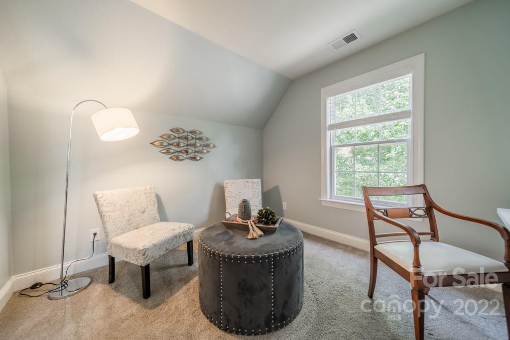 9622 Baileywick Road Charlotte, NC 28277 - Photo 28 of 39 a living room with furniture and a window