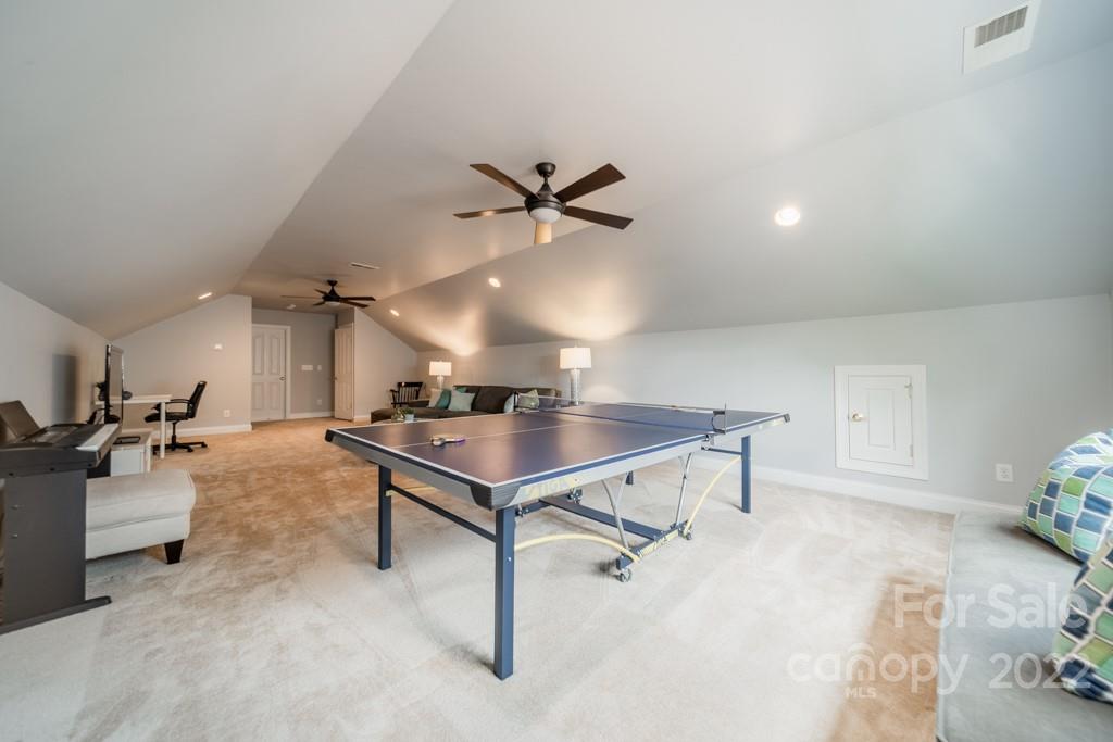 9622 Baileywick Road Charlotte, NC 28277 - Photo 33 of 39 a living room with furniture and a table with wooden floors