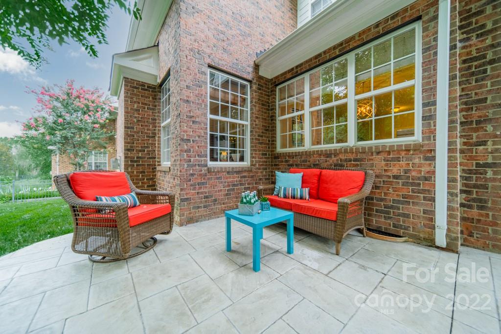 9622 Baileywick Road Charlotte, NC 28277 - Photo 35 of 39 a building outdoor space with patio furniture and a couch