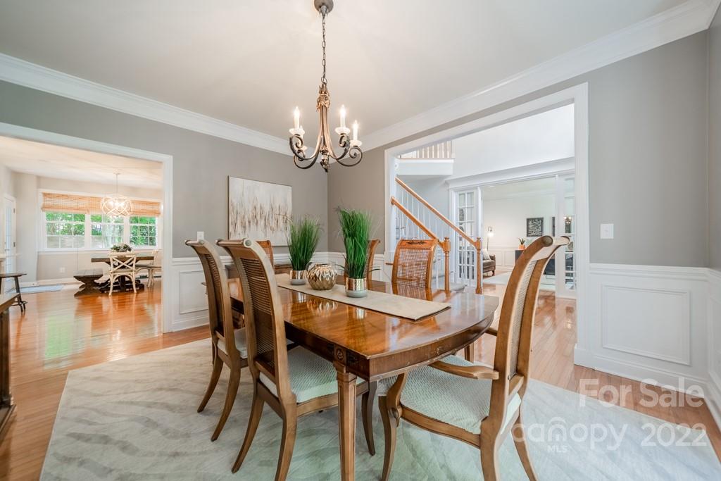 9622 Baileywick Road Charlotte, NC 28277 - Photo 8 of 39 a view of a dining room with furniture window and wooden floor
