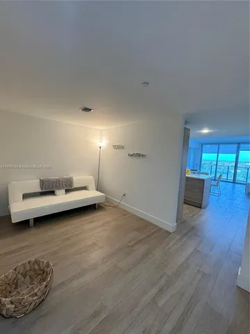 a view of livingroom with furniture and wooden floor