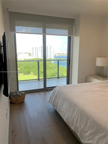 a view of a livingroom with wooden floor